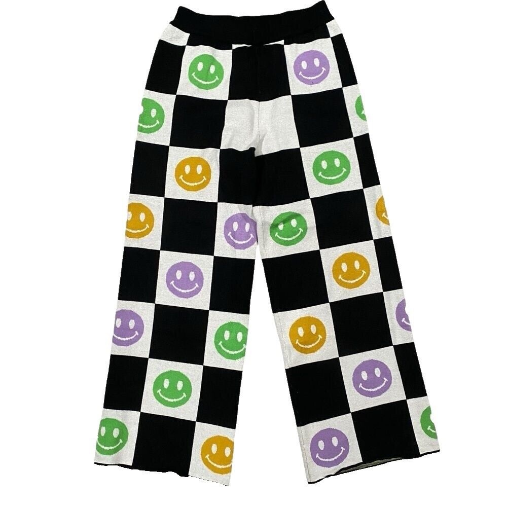 Dressed In Lala. Black and multi-coloured smiley face print wide leg pants